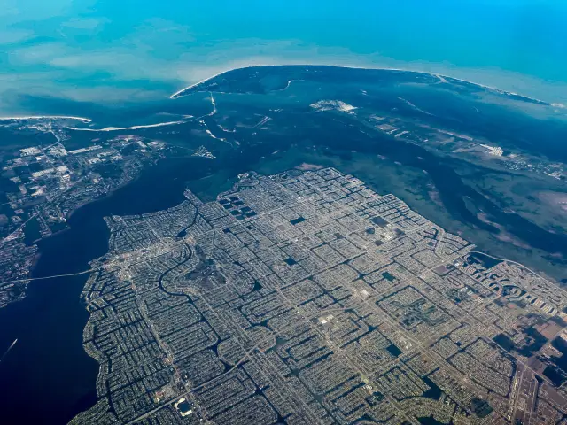 Aerial view of residential neighborhoods and canals in Cape Coral, Florida