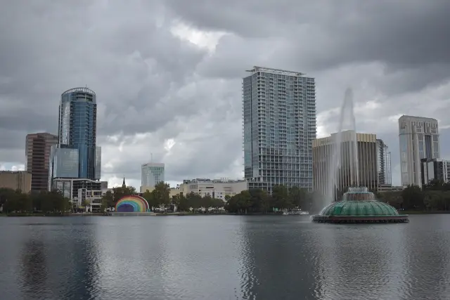 Lake Eola fountain and amphitheater with the downtown Orlando, Florida skyline